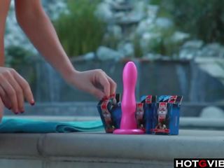 Big Titted Blonde gives herself orgasms by the pool